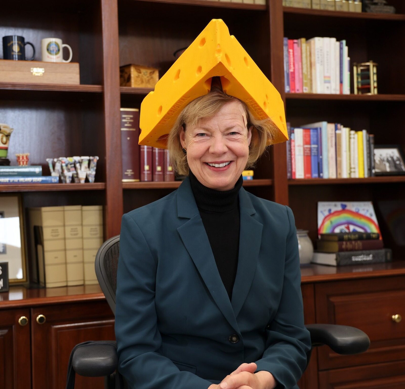tammy baldwin wearing a cheesehead